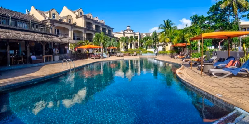 Sunset reef pool and hotel overview